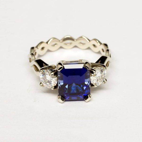 Royal Blue Sapphire & CZ Diamond 3-Stone Infinity Silver Ring – image 1